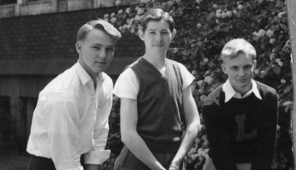 A teenage Arnold Palmer, left, poses with two young friends who played with him on the Latrobe High School golf team
