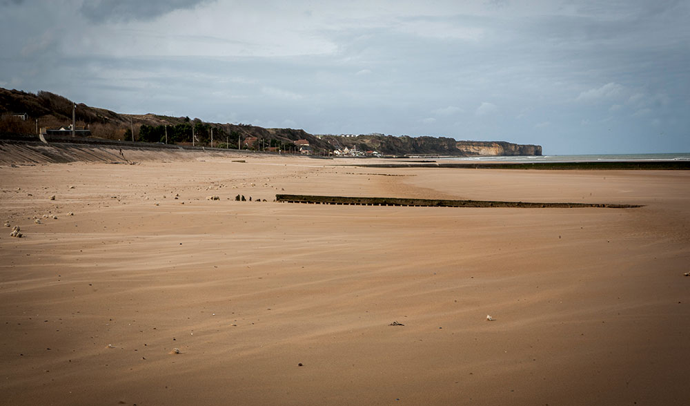 Omaha Beach overlooked by limestone cliffs in February 2014 (Photo: Leon Harris)