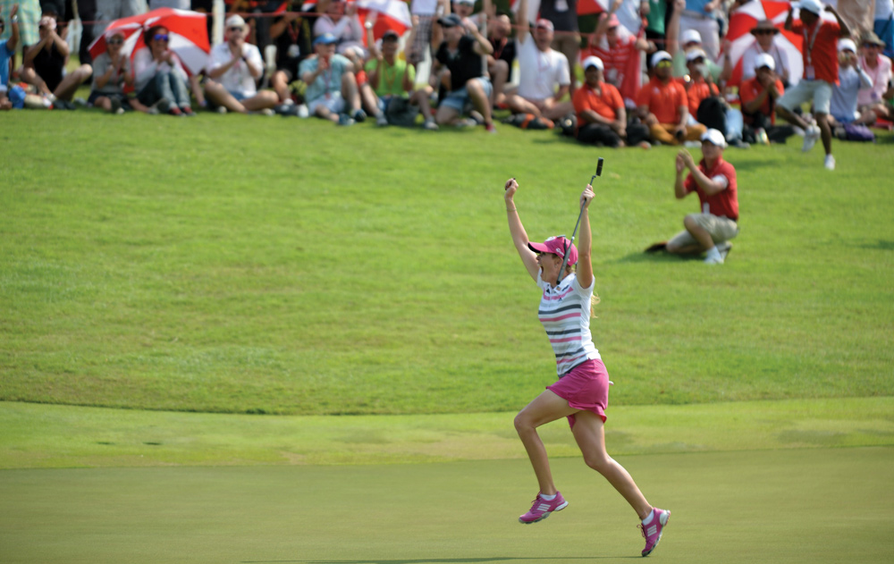 Celebrating what might have been the putt of the year on any tour