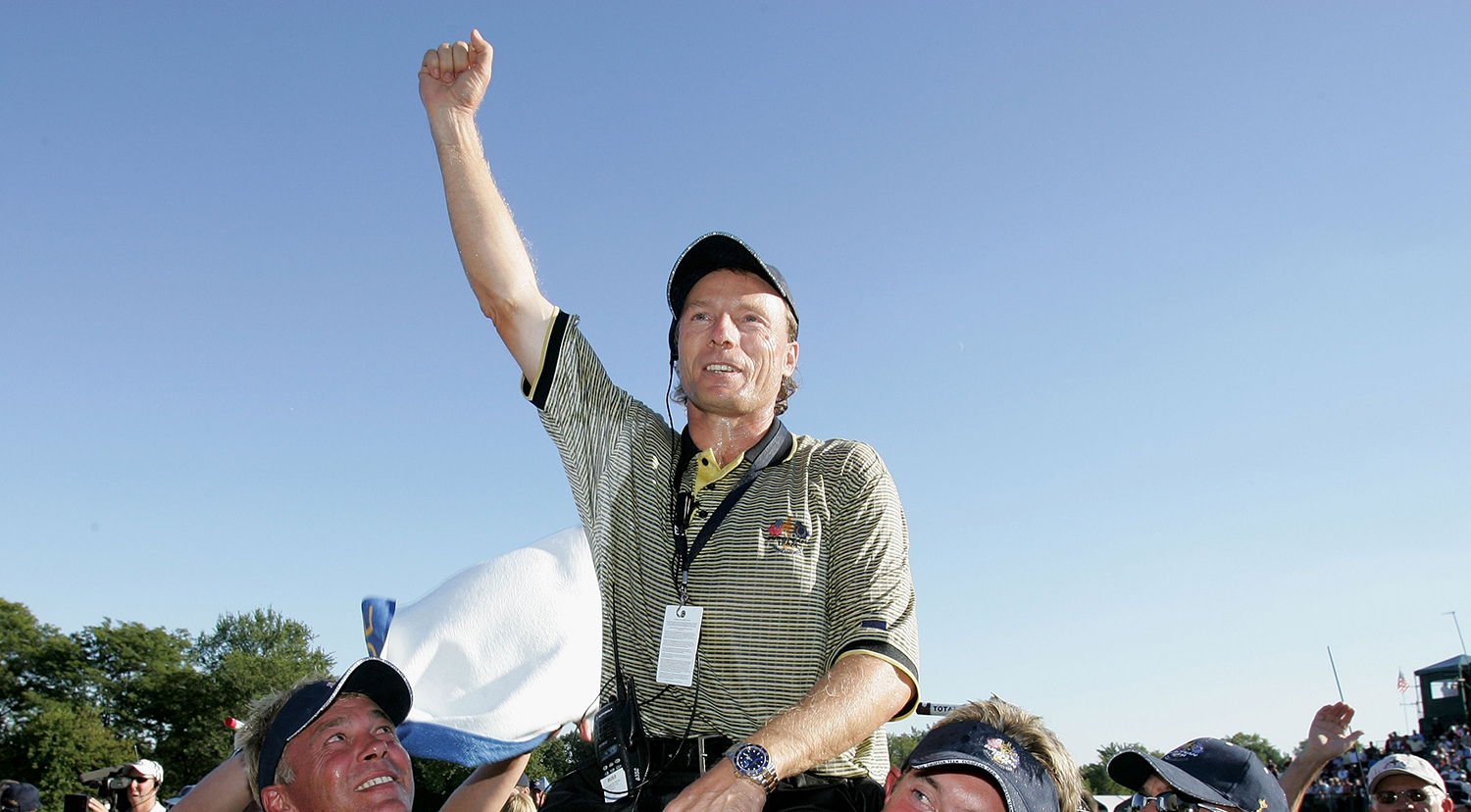 Langer is hoisted aloft by Darren Clarke [left] and Lee Westwood [right] after leading Europe to victory in the 2004 Ryder Cup at Oakland Hills