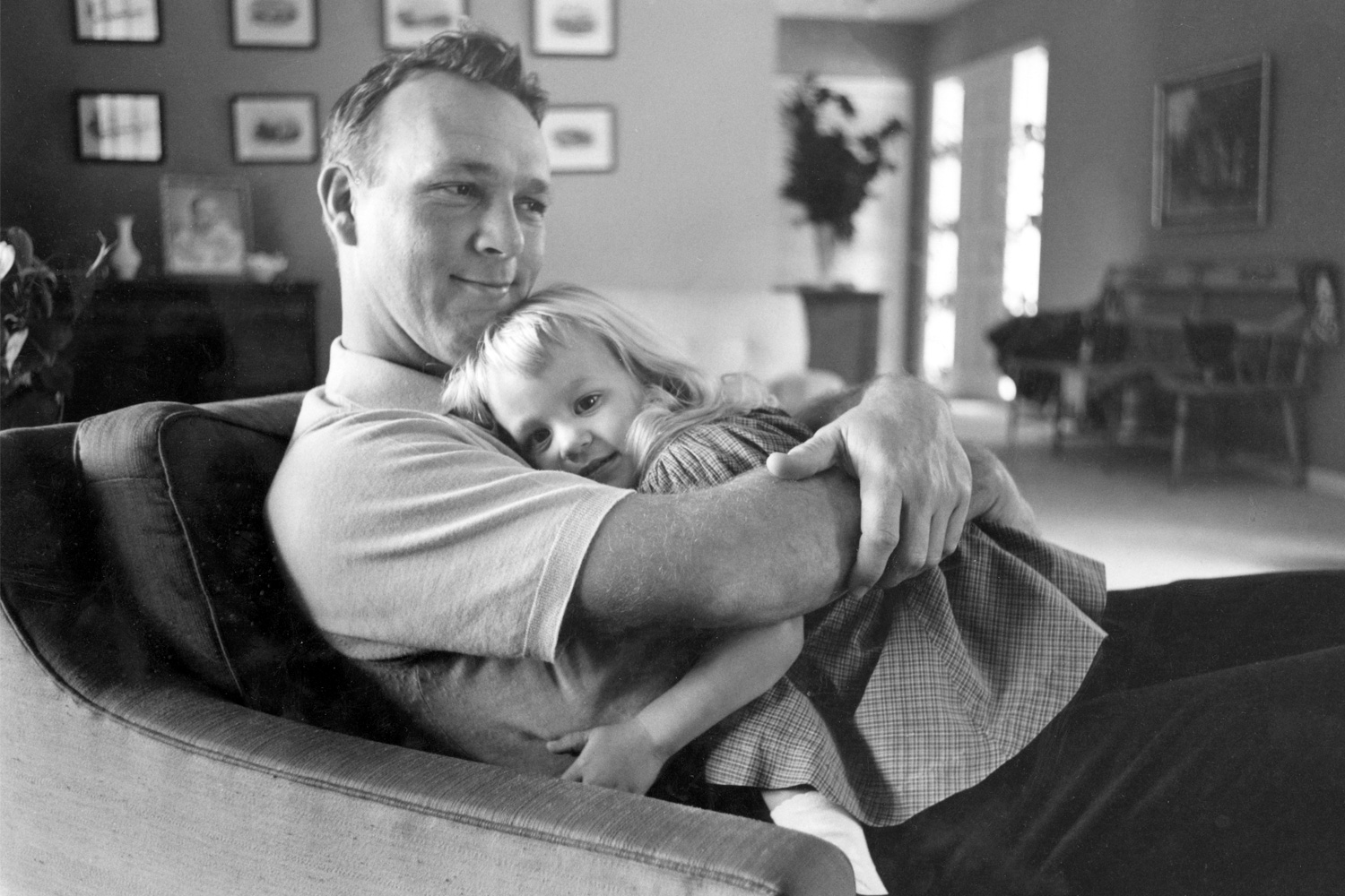 Arnold Palmer with daughter Amy in 1960